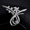 Elegant silver flower brooch with sparkling cubic zirconia stones on black background - Flower Ribbon Shape / Silver