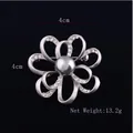Detail of silver flower brooch with grey faux pearl and crystals, size 4cm x 4cm - Floral Rain