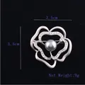 Detailed macro view of silver flower brooch with grey pearl and 3.5cm diameter size - Single Floral Heart
