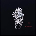 Detail view of silver floral daisy brooch with grey faux pearls and clear crystals - Daisy