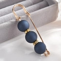Elegant gold safety pin brooch featuring matte navy blue beads and rhinestone accents - Pin Style / Dark Blue