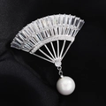 Elegant silver fan-shaped brooch with zircon stones and a round pearl pendant for coats - Silver