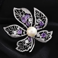 Detail of five-petal flower brooch with large white pearl and purple gemstones - Silver Maple Leaf Purple Zirconia
