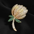 Luxurious floral brooch with multi-color cubic zirconia on elegant black silk background - Yellow