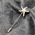 Silver starfish lapel pin with clear crystals on a black plush background - Silver Starfish (bz12)