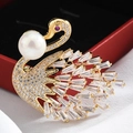 Elegant gold-plated swan brooch featuring luxury cubic zirconia and a white pearl - Gold Pearl Swan
