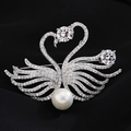 Elegant silver double swan brooch with pavé zircon stones and a large white round pearl - Double Silver Swans