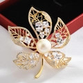 Elegant gold leaf brooch with center pearl and sparkling white zircon accents - Gold Maple Leaf