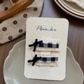 Detail of two handmade plaid fabric hair clips with black velvet bows for girls - Square Plaid Bow Hair Clip