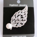 Silver leaf brooch with marquise zircons and a large white pearl on a display card - Silver Leaf White Zirconia