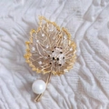 Elegant gold leaf brooch with ladybug, yellow gemstone, and large white pearl - Leaf Beetle