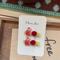 Detail of sweet pom pom hair clips featuring cartoon bear and soft velvet fabric texture - Red Polka Dot Bear