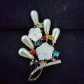 Elegant gold flower bouquet brooch with white petals, colorful crystals and pearls - Shell Pearl Flower