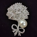 Elegant silver carnation brooch with white rhinestones, bow knot, and faux pearl - Silver Poppy
