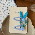 Detail of blue floral bunny ear hair clips for girls with soft plush pom pom accents - Rabbit Ears Pair (Blue) / Blue Floral