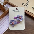 Detail of sweet floral hair clips with purple plaid fabric petals and a safe cloth wrap - Purple Houndstooth Flower Hair Clip