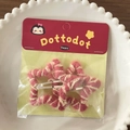 Set of two star shaped knit hair clips in pink and cream with original packaging - Light Pink