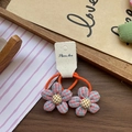 Sweet blue and orange plaid flower hair ties for girls with high elastic bands - Orange Houndstooth Flower Hair Tie