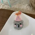 Detail of handmade wool felt grey bear brooch with pink party hat and tassels - Grey Mouse Brooch