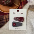 Detail of red plaid and grey tweed bow hair clips on a handmade presentation card - Red Button