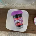 Cup-packed black high-elastic hair ties for kids with cute panda label on a white tray - Purple