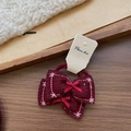 Set of two burgundy plush bow hair ties with star embroidery and small red ribbon details - Bow Scrunchie