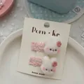 Dettaglio di fermagli per capelli a forma di coniglio con pizzo rosa per bimbe - Fermaglio per Capelli Coniglio con Pizzo