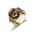 Macro shot of vintage gold-tone stainless steel ring with embossed cross design - US 8 / Gold