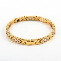 Women's gold magnetic therapy bracelet with pink rhinestones and X-shaped links - Gold