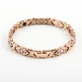 Rose gold magnetic therapy bracelet featuring pink crystals and XO link pattern - Rose Gold