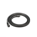 Close-up of oxidized stainless steel Franco chain with a textured cylinder clasp - Antique Silver
