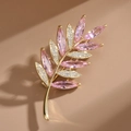Elegant gold olive branch brooch with pink marquise crystals and white pave diamonds - Pink Zircon