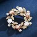 Luxury butterfly wreath brooch with freshwater pearls and cubic zirconia on blue velvet - Golden Freshwater Pearl Wreath