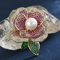 Elegant rose brooch with colorful zircon petals and pearl center on crystal base - Gradient Purple Red