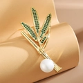 Spilla elegante in oro a forma di bambù con foglie di cristallo verde e perla bianca fine - Verde