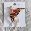 Colorful Phoenix brooch with gold plating and red crystal on jewelry display card - Multi-color