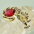 Golden tiger brooch with white crystals, black enamel stripes, and a large red stone - Red