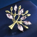 Eleganter Baum-Anstecknadel aus Gold mit rosa Kristallen auf blauem Hintergrund - Gold Rosa Marquise Kristallbaum Form / Kristallbaum