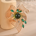 Spilla a mulino a vento in smeraldo e lega dorata con zirconi verdi e strass brillanti - Stile Mulino a Vento (Verde) / Verde