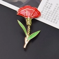 Elegant red carnation brooch in gold alloy with green crystals and enamel finish - Watermelon red