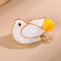 Elegant gold-plated bird brooch with white shell inlay, red rhinestone eye and yellow bead - Yellow