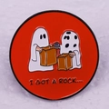 Halloween ghost enamel pin with I GOT A ROCK text on a bright orange round badge - Two Ghosts