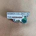 Women Belong In The Lab enamel pin with green science flask on a textured fabric - Laboratory Theme Slogan (xz211)