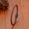 Detail of red and black braided leather bracelet with a magnetic metal clasp on wood - Black Clasp - Red/Black/Silver Braided