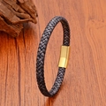 Detailed close-up of dark grey braided leather bracelet with golden magnetic clasp - 19cm / Dark Grey Braid With Gold Clasp