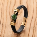 Detail of black woven leather bracelet with green clover stone and gold magnetic clasp - Gold-G