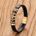Detailed macro view of black leather bracelet with golden Tree of Life charm and stones - Style D (JROSL098) / 19cm