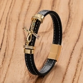 Dettaglio del bracciale in pelle nera intrecciata con fiocco dorato e strass colorati - Nodo con Strass Multicolore (Stile-F)