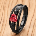 Close-up of men's leather bracelet with red stone and black magnetic metal clasp - 19cm / Large Irregular Red Stone Style