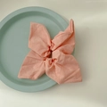 Chic peach pink oversized bow fabric scrunchie with soft cotton-linen texture - Pink